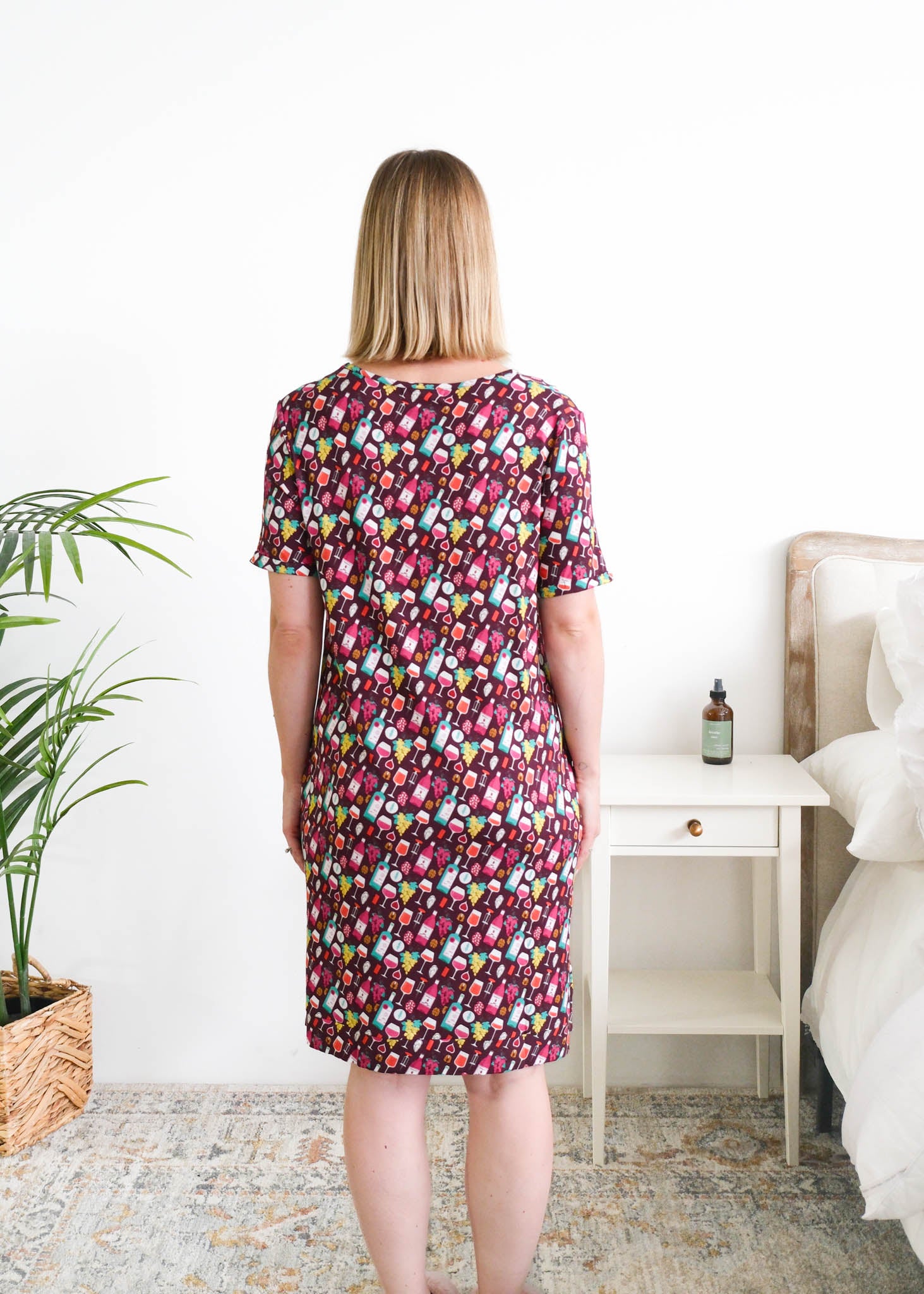 Georgia Rylan Wine Tasting V-Neck Bamboo Nightshirt model back view — Cloud Nine Pajamas Edmonton