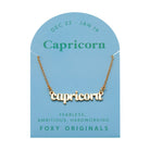 Zodiac Script Necklace in 14K Plated Gold featuring Capricorn charm with gold finish and blue background, perfect for astrology lovers.