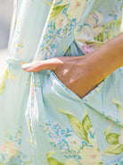 April Cornell Blanche Cotton Dress in Aqua showing pocket detail with model's hand in slit pocket