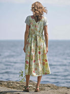 April Cornell Milene Cotton Pinafore Midi Dress Sage Green with Hand-Crochet Neckline showing back and tie details