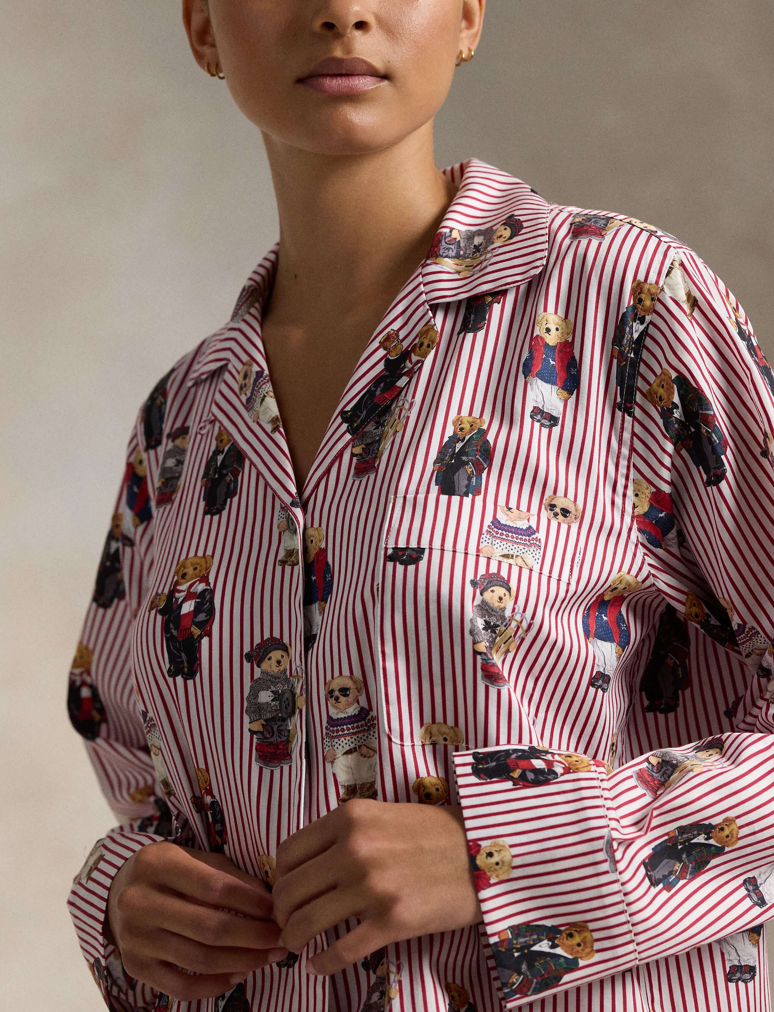 Woman modeling the Iconic Polo Bear Cotton Sateen Madison PJ Set Polo Ralph Lauren featuring playful Polo Bear prints.