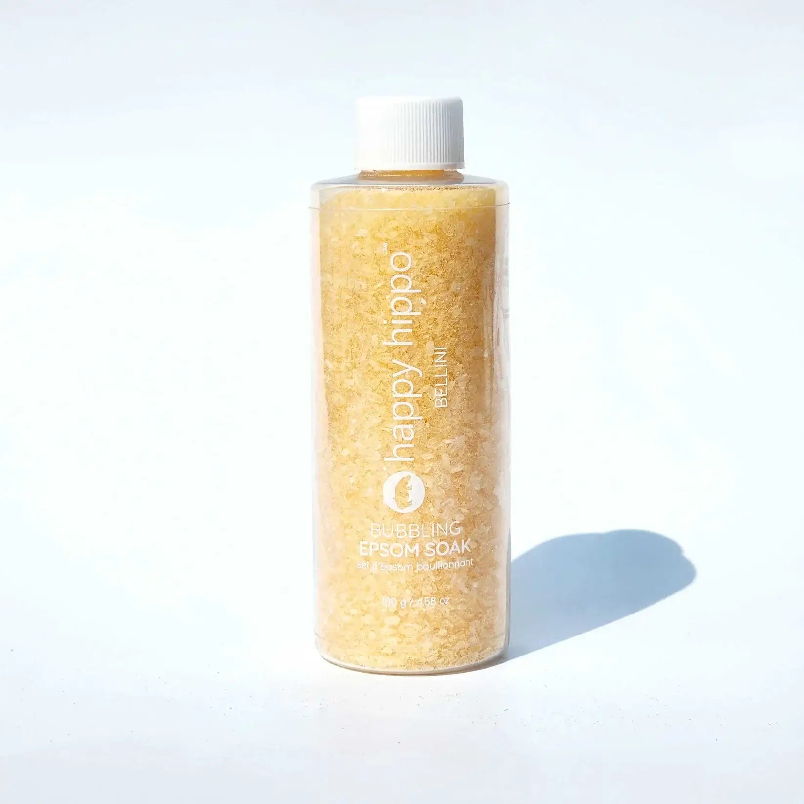 Bubbling Epsom Soak Happy Hippo Bath Co. bottle filled with natural Epsom salts for a relaxing bath experience.
