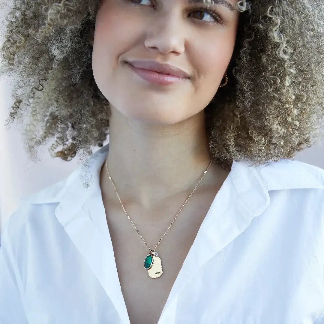 Birthstone Charm Necklace in 14k Plated Gold featuring emerald stone and 'HOPE' tag by Foxy Originals.