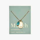 Birthstone Charm Necklace in 14k Plated Gold featuring aquamarine stone and serenity intention for March.