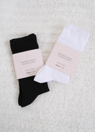 Georgia Rylan bamboo crew socks black and white mid-calf pair flat lay — Cloud Nine Pajamas