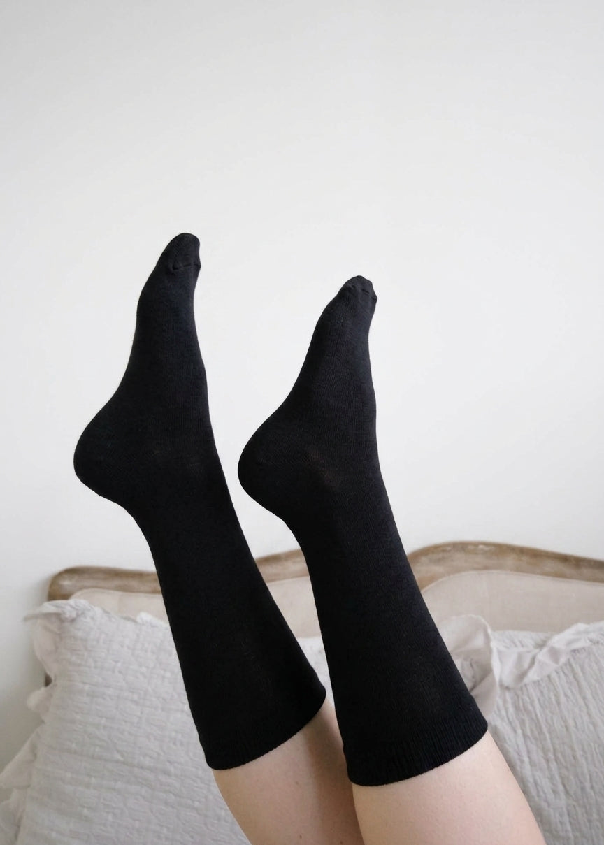Georgia Rylan black bamboo crew sock lifestyle on model — Cloud Nine Pajamas