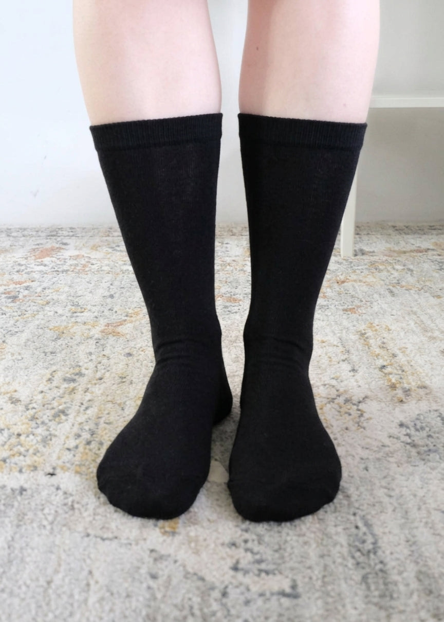 Georgia Rylan black bamboo crew sock on model — Cloud Nine Pajamas