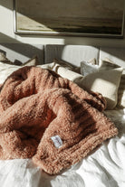 mocha brown super soft oversized throw blanket in polyester blend. Washable. 