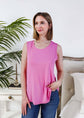 Woman wearing Bubblegum Pink Essential Bamboo Tank Top, showcasing comfort and style in a bright pink color.