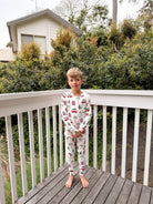 kids matching pj set in bamboo beachy cali christmas print from bambi and birdie