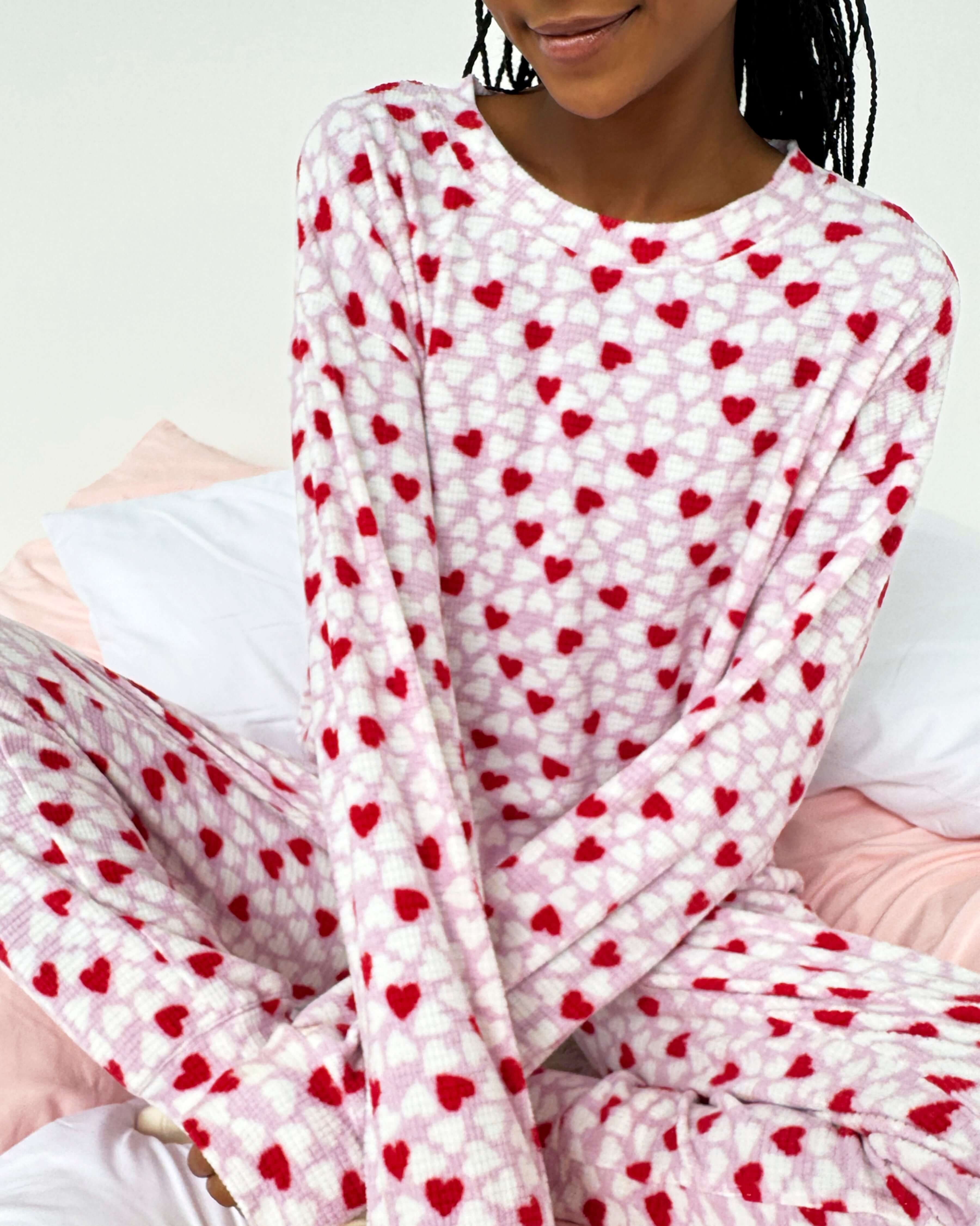 women's soft thermal waffle pajama set with heart print on pink background from Splendid