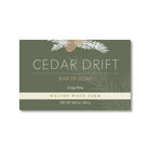 Cedar Drift Bar Soap Bar of soap with 'Cedar Drift' branding on a green background by walton wood farm, pine scent