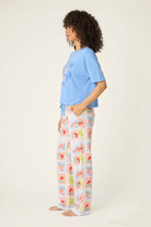 Frutta Fresca Ciao Bella Fruit Print PJ Set by PJ Salvage model wearing side view in blue and colorful fruit print