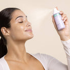 Cozy Comforts Soothing & Protecting Skincare Essential Kit Patchology spray application on glowing skin.