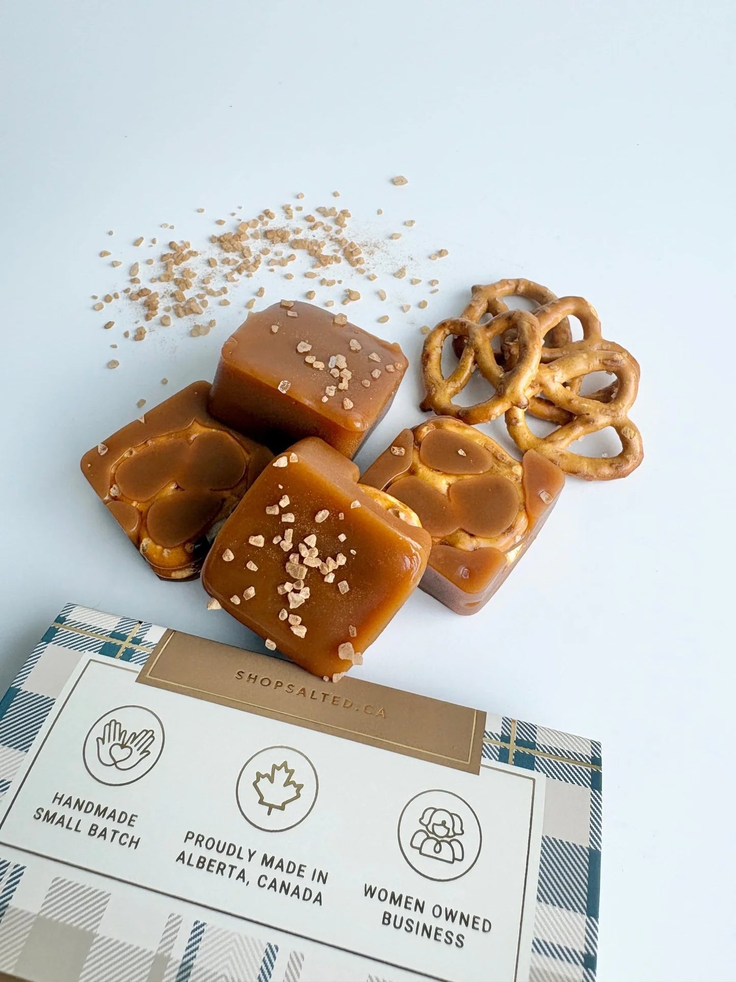 Salted Crisp and Cozy handcrafted caramels close-up apple pretzel salted caramel — Cloud Nine Pajamas