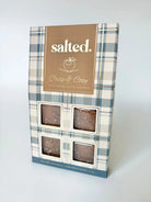 Salted Crisp and Cozy 4-piece caramel box plaid and gold foil packaging — Cloud Nine Pajamas Edmonton