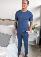 Denim Blue Unisex Bamboo Jogger worn with matching top for a cozy look, featuring soft bamboo fabric.