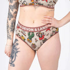 Devon + Lang Bria Full Coverage Bikini Brief featuring a unique tattoo-inspired print.