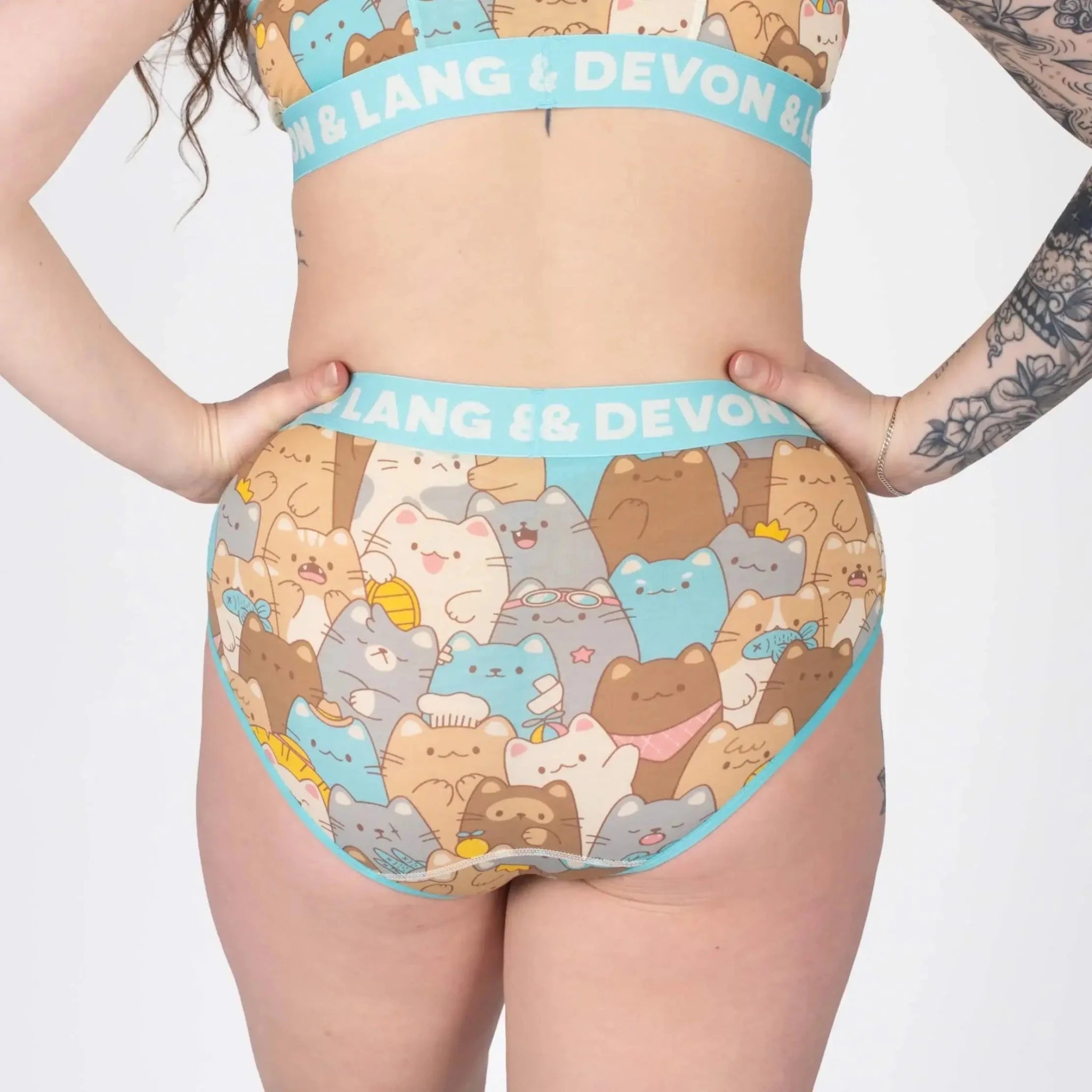Devon + Lang Bria Full Coverage Bikini Brief featuring a playful cat print and comfortable waistband.