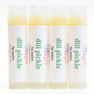 Dill Pickle Lip Balm tubes arranged in a row, featuring a crunchy dill pickle flavor and hydrating ingredients.