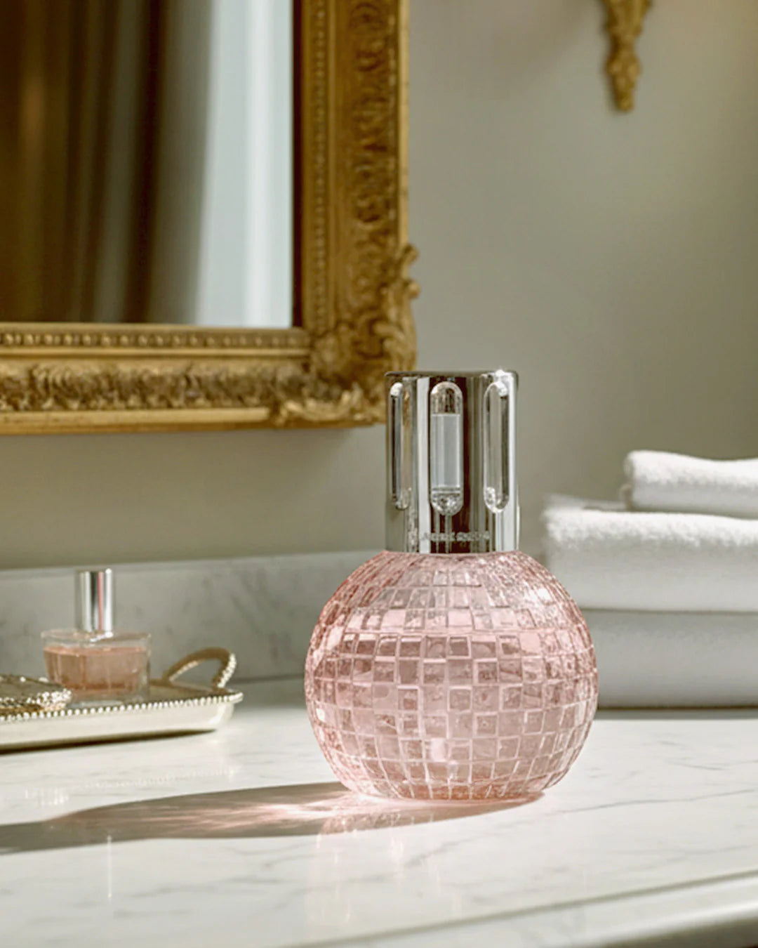 Maison Berger Paris Disco Fragrance Lamp Gift Set featuring a pink lamp and fragrance bottle.