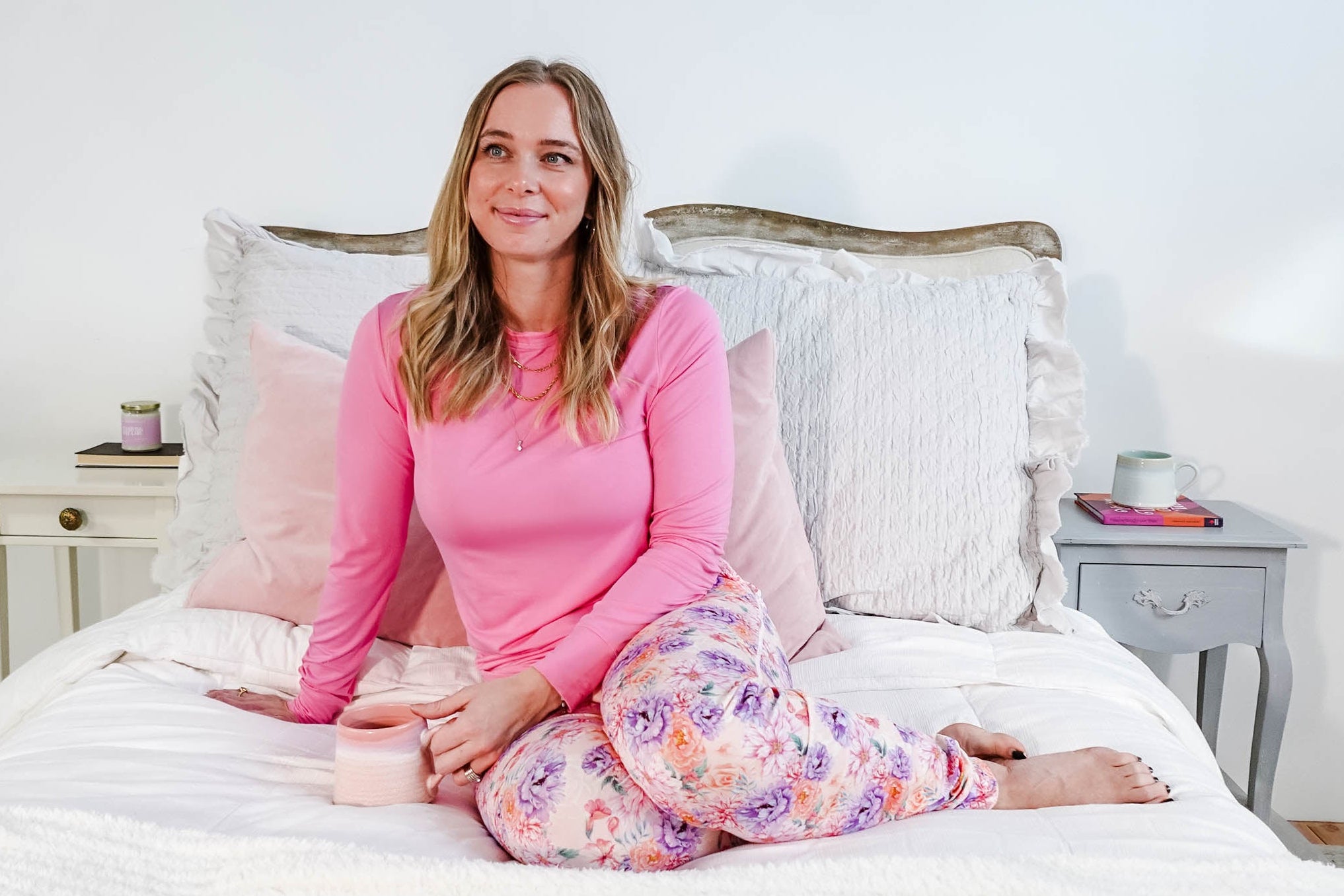 dream in bloom long sleeve jogger bamboo set worn by model on white bed