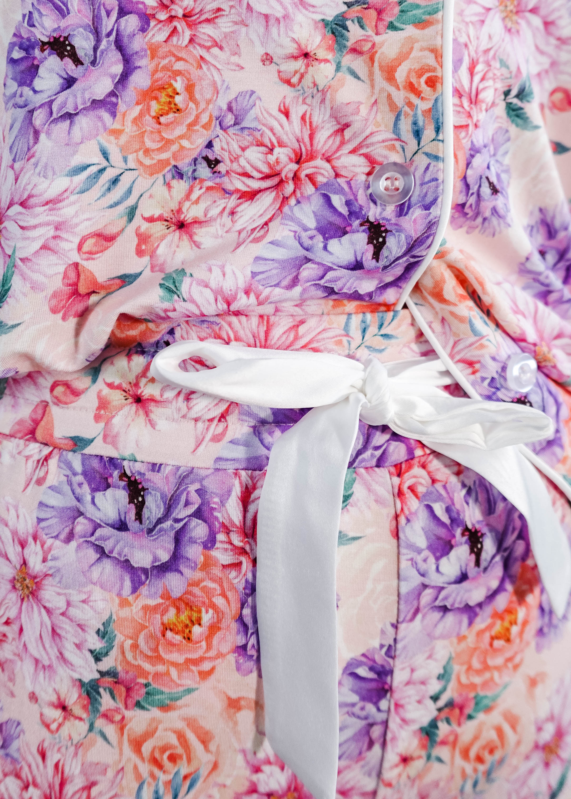 Dream in Blooms Long Sleeve Button Up & Pant Bamboo Lounge Set featuring floral design and white tie detail.