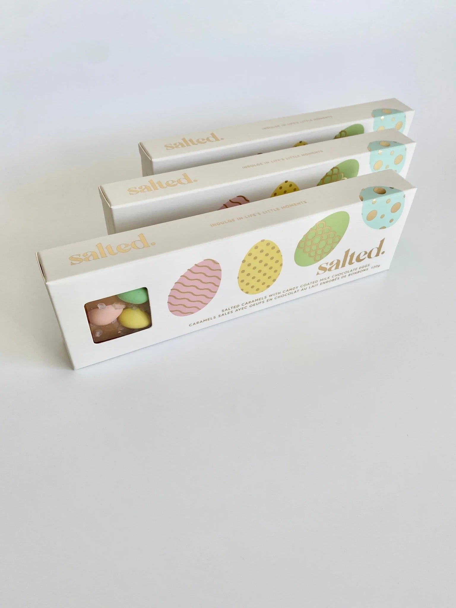 Easter Egg Salted Caramel - 4 piece box featuring colorful candy-coated chocolates.