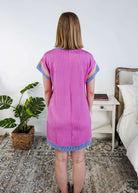 Person wearing a pink dress with blue trim in a bedroom setting Scarlett Ellie Everyday Relaxed T-Shirt Dress | Cloud Nine Pajamas