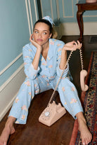 Fizz The Season Flannel Set | PJ Salvage Champagne Print Button-Up Pajamas women's light blue flannel pajamas with champagne and poinsettia print