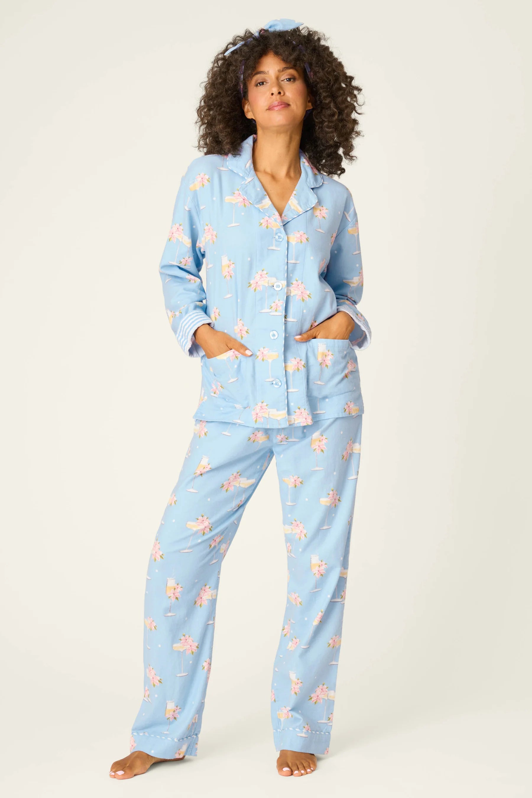 Fizz The Season Flannel Set | PJ Salvage Champagne Print Button-Up Pajamas women's light blue flannel pajamas with champagne and poinsettia print