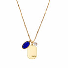 Birthstone Charm Necklace in 14k Plated Gold featuring September sapphire stone and 'TRUTH' charm by Foxy Originals.