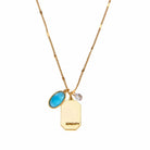 Birthstone Charm Necklace in 14k Plated Gold featuring aquamarine stone and serenity intention for March.