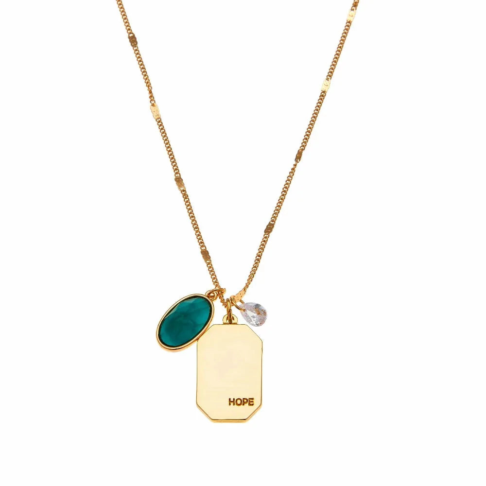 Birthstone Charm Necklace in 14k Plated Gold featuring emerald stone and 'HOPE' tag by Foxy Originals.