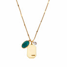Birthstone Charm Necklace in 14k Plated Gold featuring emerald stone and 'HOPE' tag by Foxy Originals.