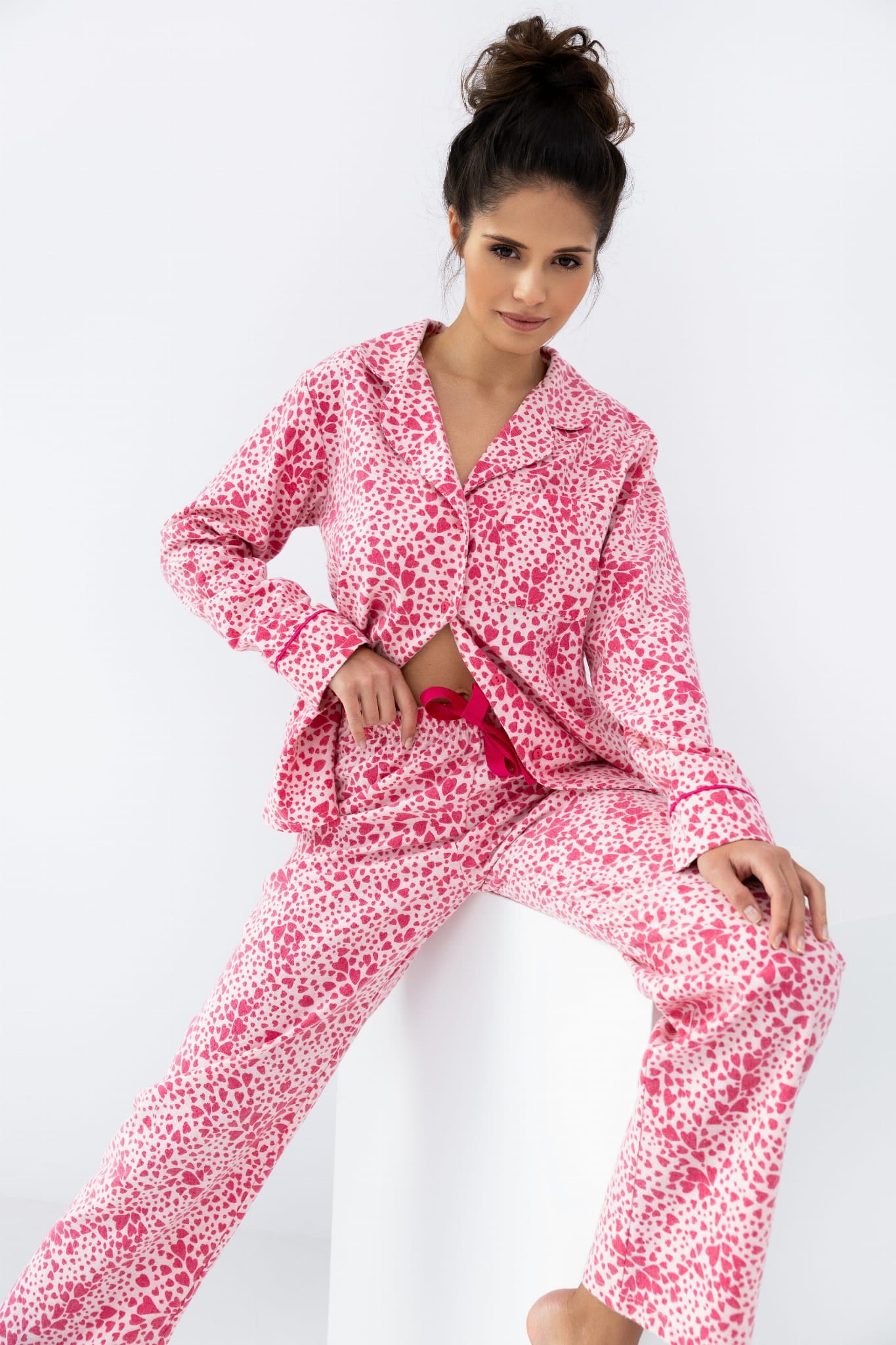 Model wearing the Sensis Giuliana Flannel Pajamas in a button-up shirt and long straight pants, showing the elegant cut.