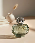 Maison Berger Rosalie Fragrance Lamp Green styled on desk lifestyle — Cloud Nine Pajamas Edmonton