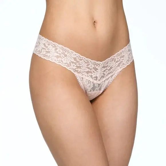 Hanky Panky Low Rise Thong in light pink lace, designed for comfort and a modern fit, suitable for everyday wear.