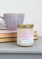 large coconut soy wax candle that says "happy birthday, make a wish!" - vanilla cake scented