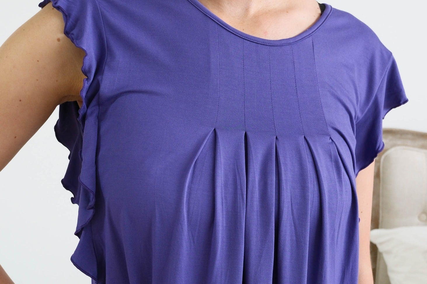 Close up of the pleated front details on the bamboo pajama set in blueberry blue colour