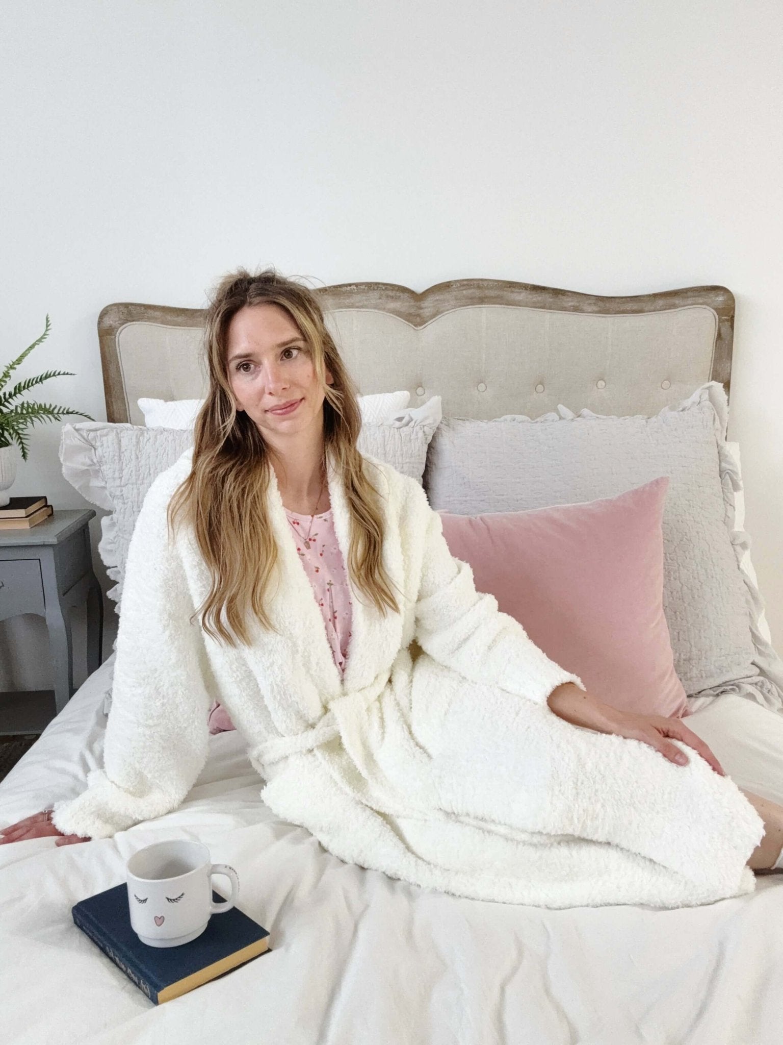 Ivory Chenille Cloud Spa Blanket Robe | Ultra Soft shown on model on a bed