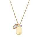 Birthstone Charm Necklace in 14k Plated Gold for JUNE featuring a pearl and 'LOVE' charm on a blue card by Foxy Originals.