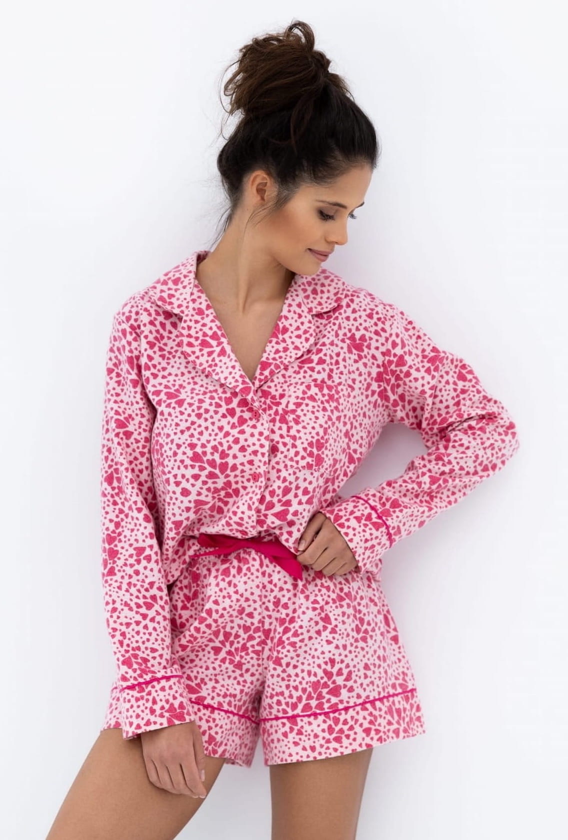 Model wearing the Sensis Kenzie Flannel Pajamas in the "Leopard Love" print, showing the button-down shirt and shorts.