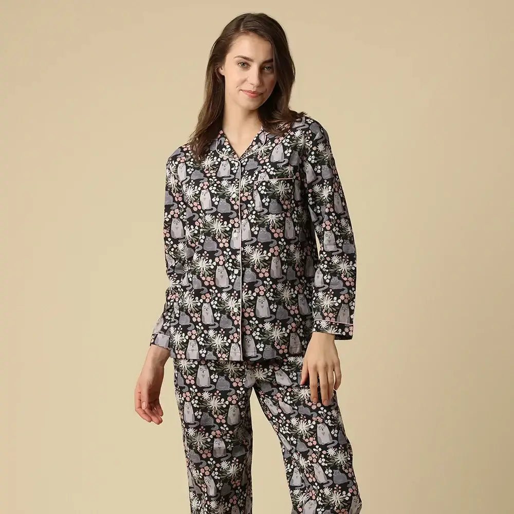 Kitty Cat Cotton Button Up Long Sleeve PJ Set featuring grey cats among flowers, modeled by a woman.