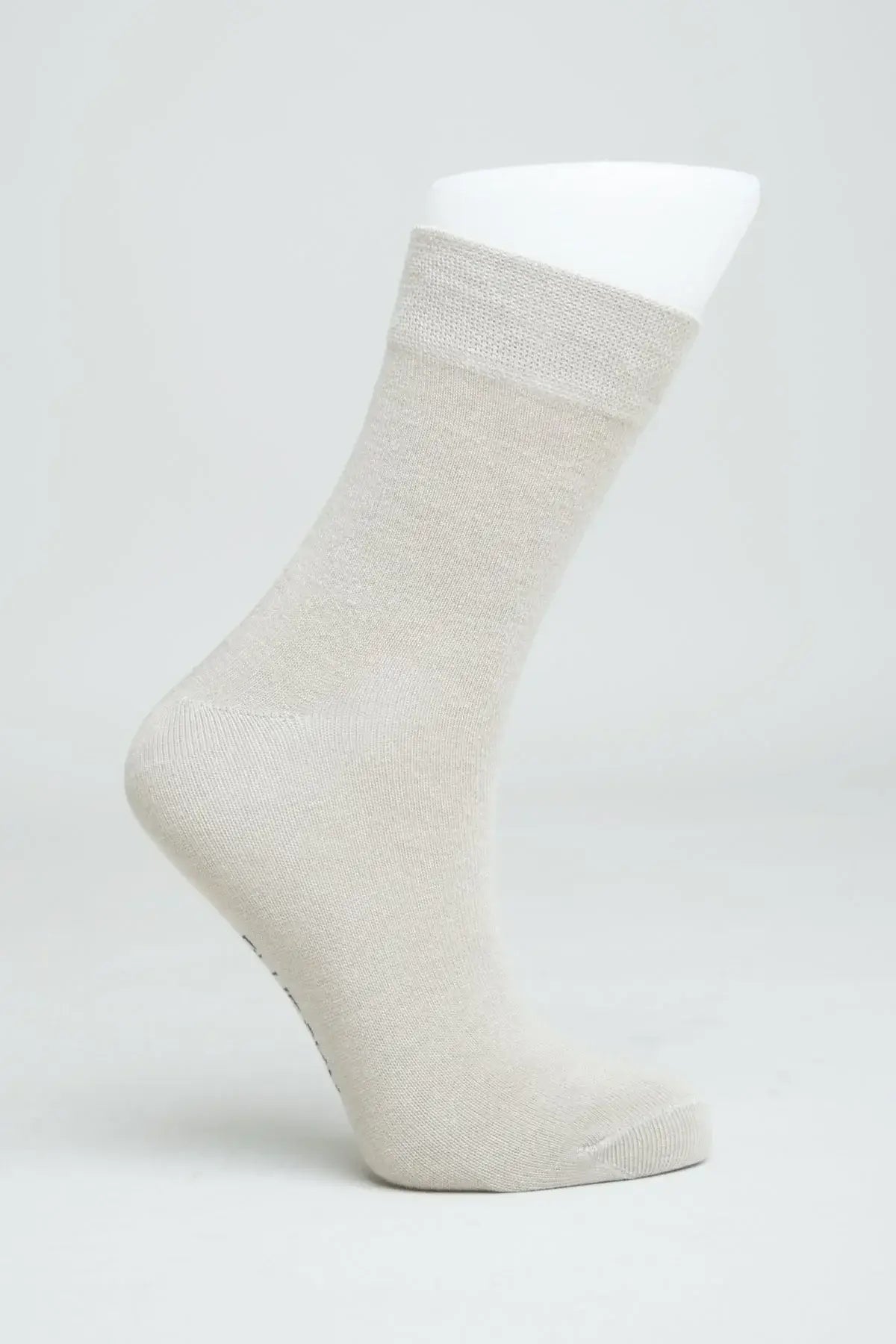 Ladies Bamboo Crew Dress Socks in beige color showcasing moisture-wicking and antibacterial features.