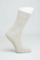 Ladies Bamboo Crew Dress Socks in beige color showcasing moisture-wicking and antibacterial features.