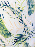 Tropical leaf pattern with green, blue, and beige leaves on a light blue background, Light Blue Leaves print by Latte Love