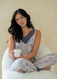 Latte Love - Lace Tank & Pant Set | Multiple Prints worn by a model holding a cup, showcasing its comfort and style.