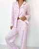 Flora Pillowsoft Sleep Set Splendid featuring silky soft button-down pajamas in pink with patterned bow details.