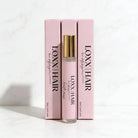 LOXX Haute Mess Hair & Body Fragrance – 10mL Travel Size in elegant packaging with gold accents.